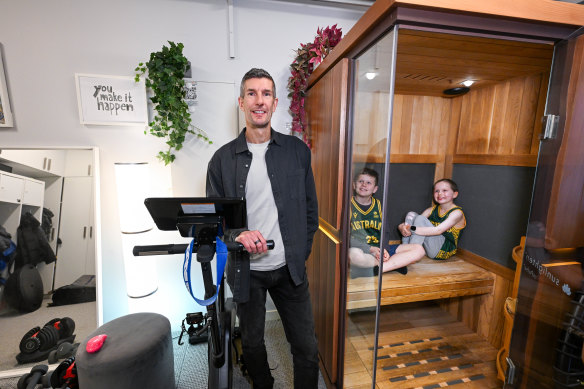 Sauna and a CAROL bike are part of Thomas’ routine, pictured here with his children.