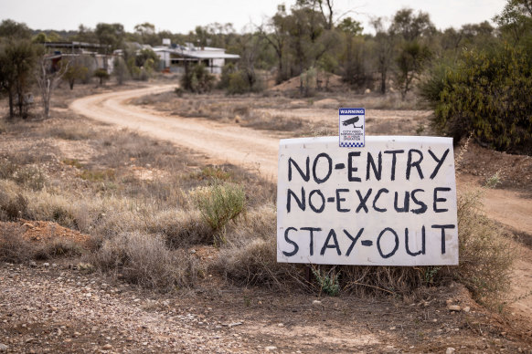 Opal miners often stake signs outside their claims to deter visitors.