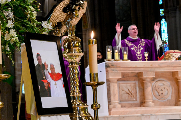 Archbishop Peter Andrew Comensoli during Mass at St Patrick’s Cathedral in East Melbourne after the death of George Pell and recent death of Pope Benedict XVI. 