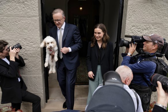 Anthony Albanese and Toto, with Finnish Prime Minister Sanna Marin.
