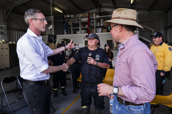 NSW Premier Dominic Perrottet visits volunteers and emergency personnel while touring flooded Moree in NSW.