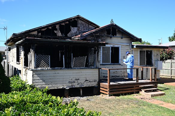 Police at the scene of the fatal house fire in Toowoomba.