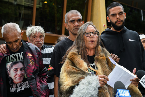 Aunty Donna Nelson, mother of Veronica Nelson, with family and supporters outside the Coroner’s Court this week. 