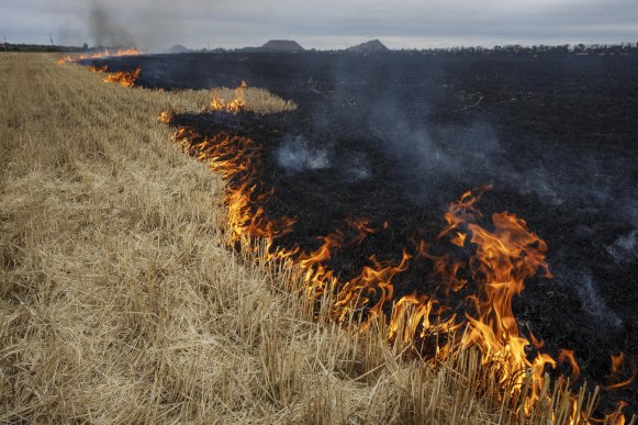 Grain fields burn, on the outskirts of Kurakhove, Donetsk Oblast, eastern Ukraine, on Thursday, July 21.