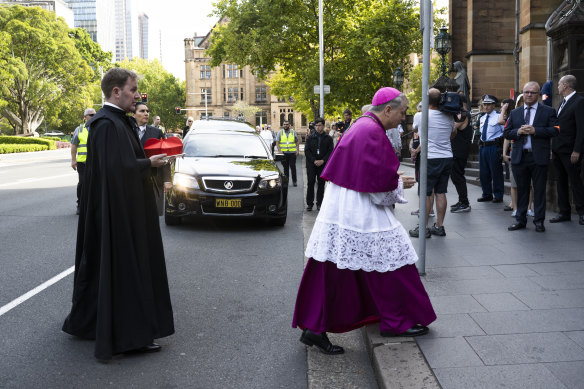 George Pell’s coffin is carried into Sydney’s St Mary’s Cathedral where he lies in state until his funeral.