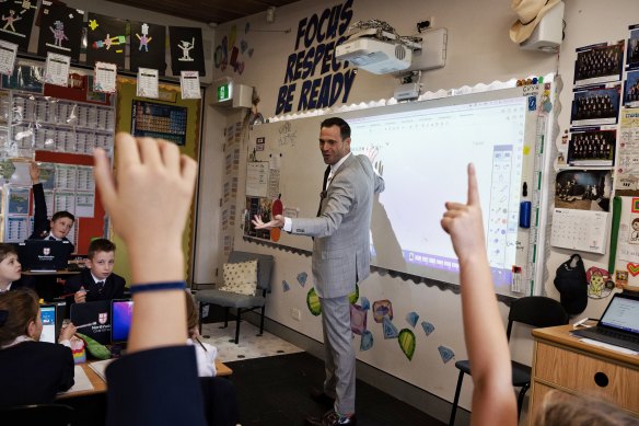 Teacher Matt Garrett with his year 4 students at Northholm Grammar School