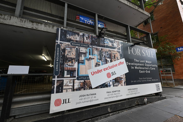 An “under exclusive offer” sticker has gone up on the car park’s sale sign. 