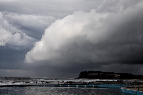 A shelf cloud moves up the coastline at Collaroy.
