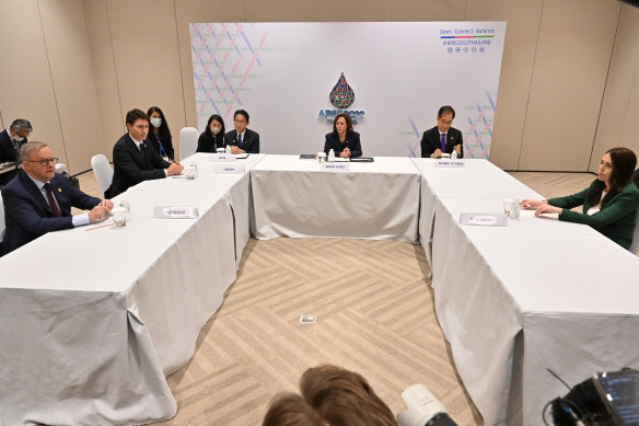 Prime Minister Anthony Albanese, Canada’s Justin Trudeau, Japan’s  Kishida Fumio, US Vice President Kamala Harris, South Korea’s Han Duck-soo and New Zealand PM Jacinda Ardern discuss North Korea’s missile launch at the 2022 APEC meeting in Bangkok, Thailand, on Friday.