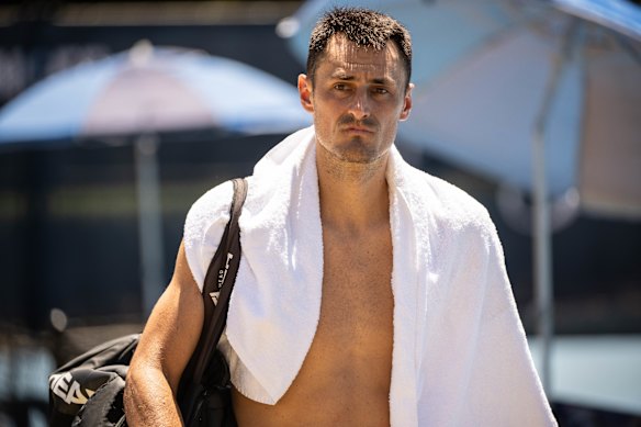 Bernard Tomic leaves the court after his defeat.