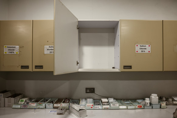 Empty shelves inside the pharmacy at Rafik Hariri Hospital in Beirut.