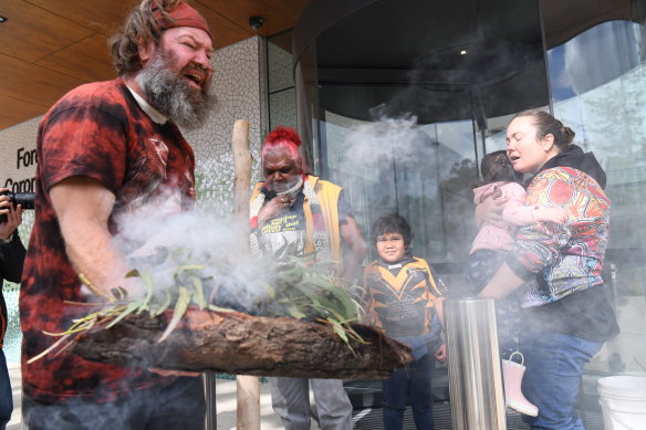 A smoking ceremony is held at the NSW Coroners Court in July 2022 during the inquest for Mootijah Shillingsworth, who died from an ear infection.