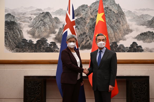 Foreign Affairs Minister Penny Wong with Chinese counterpart Wang Yi in Beijing in December. 