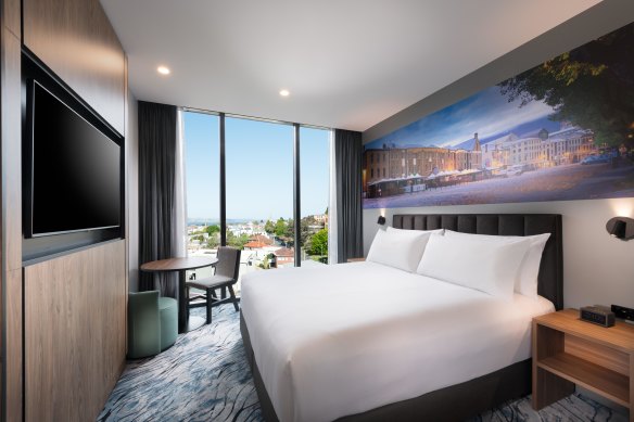 A king room with its floor-to-ceiling view.