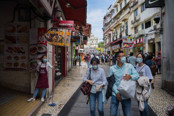 Chinese tourists in Macau wear masks amid the coronavirus outbreak.