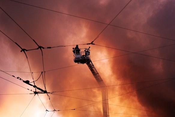 Smoke rises from the aftermath of the Russian strikes on Kyiv on Sunday.
