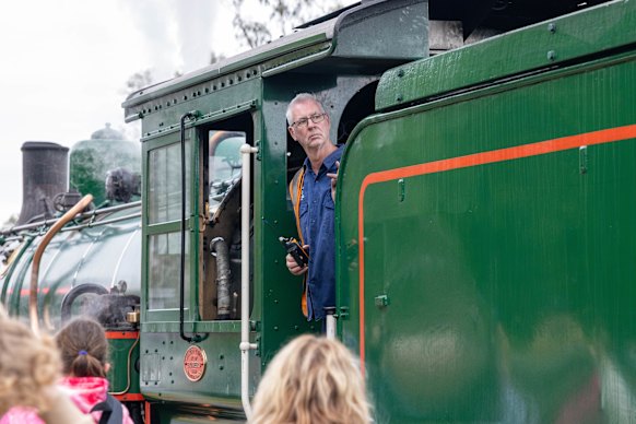 Driver Chris Halliday with a BB18 ¼ steam engine train used by Queensland Rail for special events.