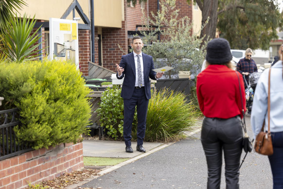 Ray White Brunswick auctioneer Jamil Allouche at the sought-after townhouse.