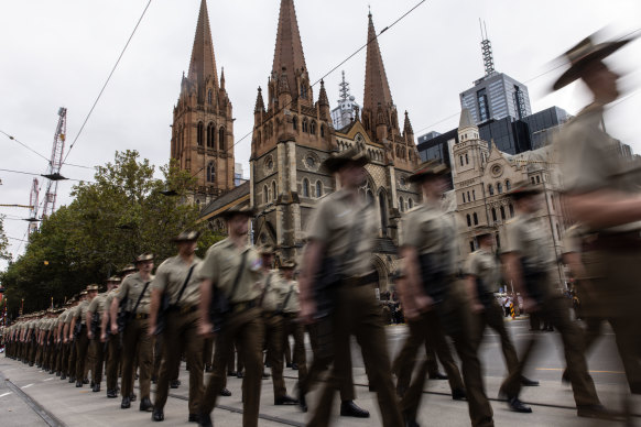 The Melbourne Anzac Day march passes St Paul’s Cathedral.