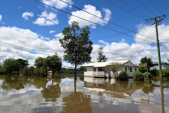 A flooded property in the Brisbane suburb of Rocklea, where some owners have accepted buyback offers.
