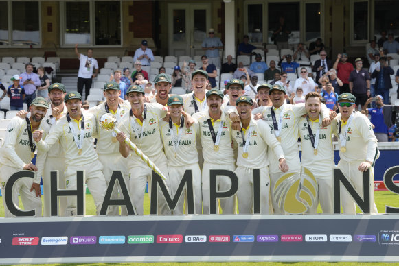 The Australian team celebrate winning the World Test Championship.