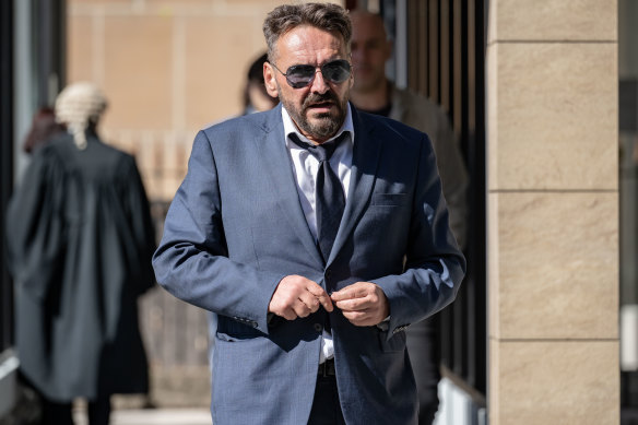 George Alex outside the NSW Supreme Court at Darlinghurst on Monday for his trial in which he is accused of conspiring with others to defraud the Australian Taxation Office of more than $13 million.