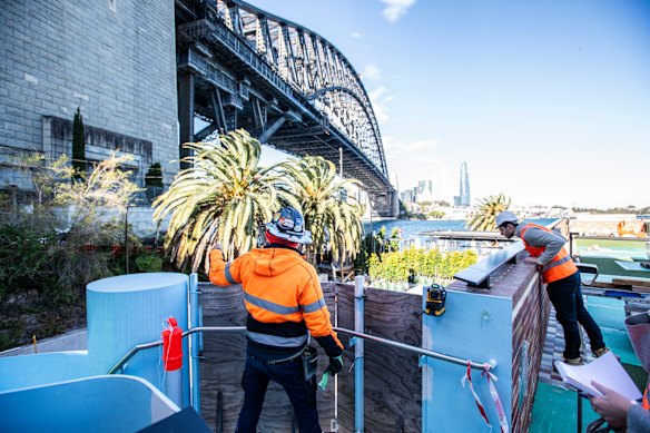 The crane is down, but work continues to complete the pool by Christmas.