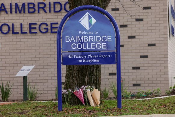 Flowers are laid at Baimbridge College.