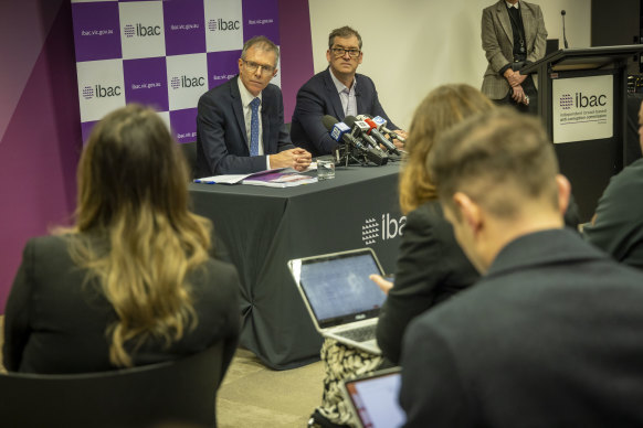 IBAC Acting Commissioner Stephen Farrow (left) and Deputy Commissioner David Wolf address reporters at the press conference after the release of the Operation Sandon report.