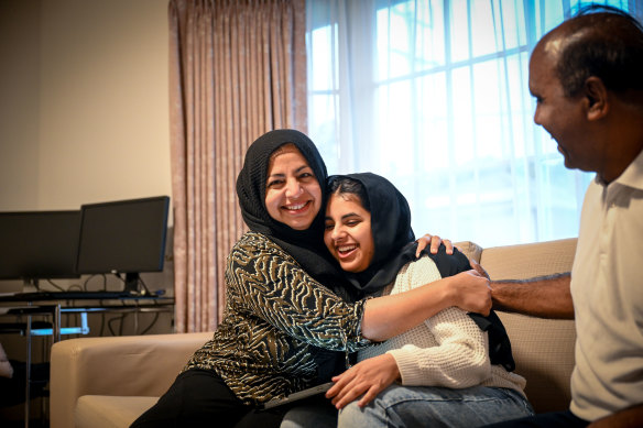 Hamna Sajid celebrates her ATAR result with parents Masooma Naseer Cheema, left, and Sagid Randhawa.