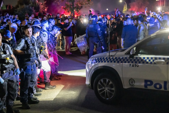 Police said a riot erupted outside the Christ The Good Shepherd Church at Wakeley after a large crowd gathered on Monday night.