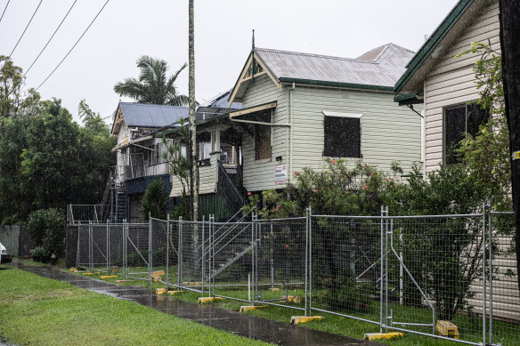 Temporary fencing around homes bought back by the government after the ’22 Lismore floods.