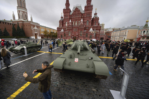 A man takes a selfie at a legendary Soviet era T-34 tank on display during an open air interactive museum at Red Square, Moscow, last week.