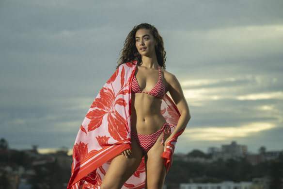 Tash Galgut models Seafolly swimwear on Bondi Beach. Seafolly is expanding with new direct-to-consumer sites in the UK, plus new sites for the US, Australia and Singapore.