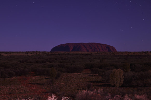 What they’re here to see … Uluru’s majestic presence.