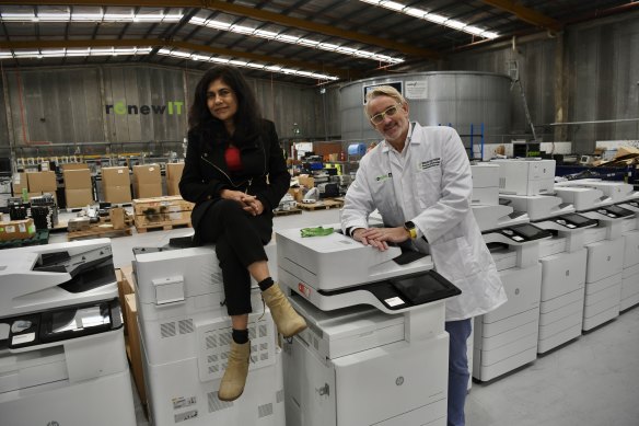 University of NSW’s Professor Veena Sahajwalla and Renew IT chief executive James Lancaster in his warehouse of old office equipment.