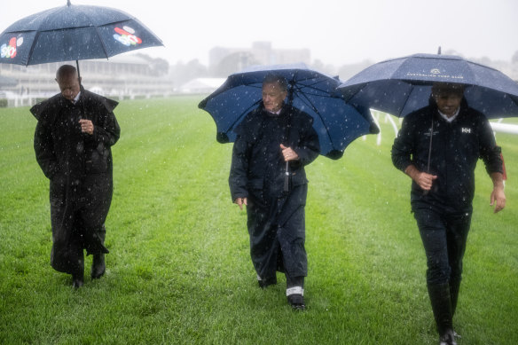Racing NSW stewards Kim Kelly and Steve Railton inspect Randwick with racecourse manager Michael Wood on Friday.