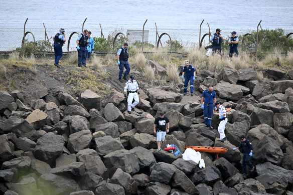 Emergency services by The Gravel Loader Dive Site on Saturday morning, where a man was declared dead.