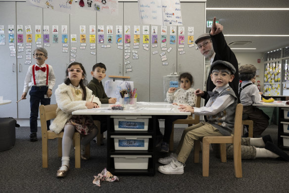 Children dress up as if they are 100 years old, while learning about the number 100 on the day.