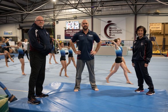 Manly Warringah Gymnastics Club CEO Ian Hardy and coaches Cody Moore and Xiao Qing Li.