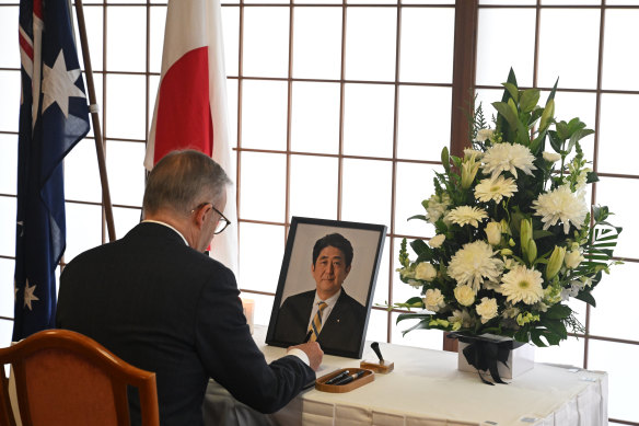 Prime Minister Anthony Albanese signs a condolence book for former prime minister Shinzo Abe at Japan’s embassy in Canberra in July.
