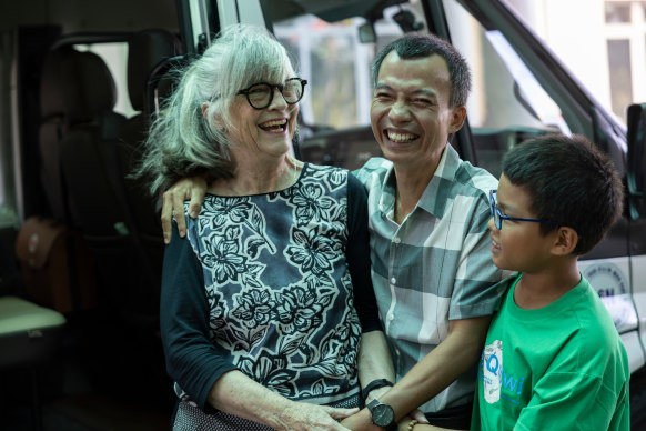  Tran Van Giap, pictured here with Gabi Hollows and his 10-year-old son Tran Binh Minh, became a maths teacher.