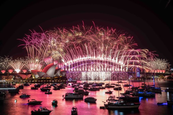 The midnight New Year’s Eve fireworks on Sydney Harbour, viewed from Mrs Macquaries Chair.
