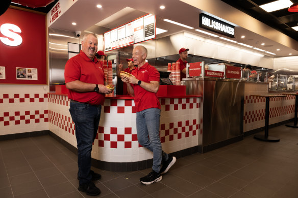Phil Keelan, Five Guys Australia head of operations, and Joel Bearden, marketing vice president, at the newly opened Martin Place Metro outlet. 