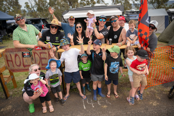 Peter Bloom (back row, third from left) with Russell Smith (holding his baby girl) and three generations of Holden fans.