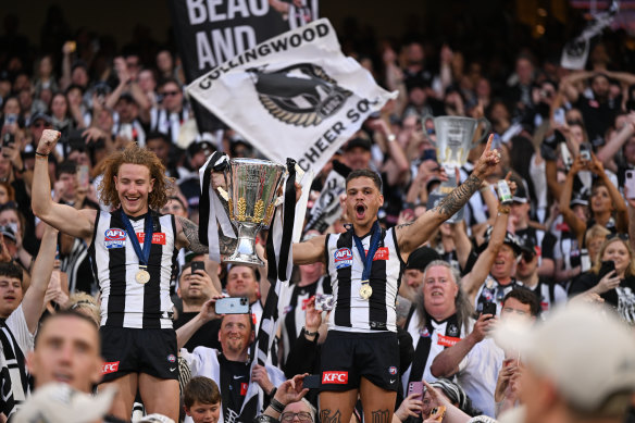 Beau McCreery and Bobby Hill celebrate their grand final victory.