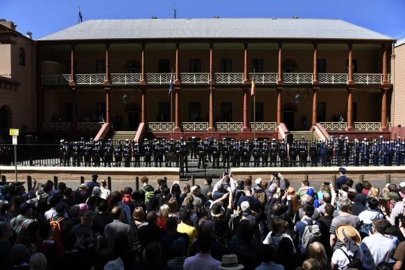 A crowd gathers at NSW Parliament for the proclamation of King Charles.