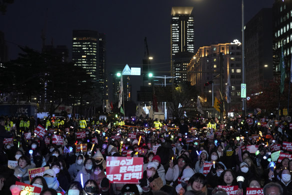 Participants gather to stage a rally demanding South Korea President Yoon Suk Yeol’s impeachment.