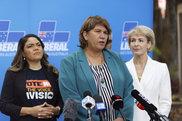 Kerrynne Liddle (centre) with Coalition senators Jacinta Price and Michaelia Cash.