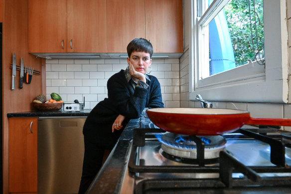 Environment reporter Miki Perkins in her kitchen with a three-year-old gas cooktop. Perkins monitored the air quality for a week and was surprised by the results.